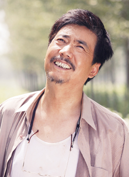 电视剧《手机》剧照剧中,很多桥段都是范明自己设计的,他参考了老家二