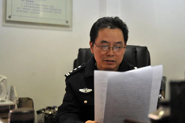 赵熙华在做事中。上海黄浦公安 供图