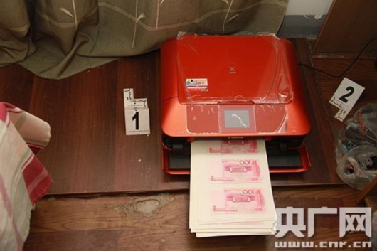 四川破获今年最大制售假币案 收缴近60万假钱[图]_新浪财经_新浪网