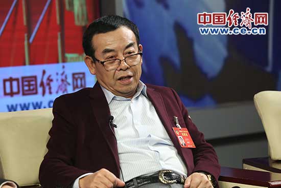 左宗申跨界融合互联互通加快制造业转型升级