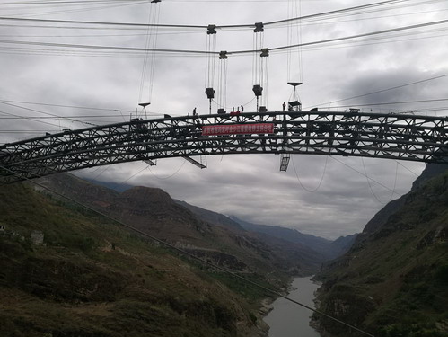 四川兴蜀公司凉山州布拖冯家坪金沙江溜索改桥项目钢管砼劲性骨架拱桥