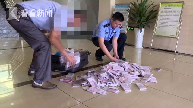 视频|男子用40万现金换来200万"美国版人民币" 仔细一看竟是冥币