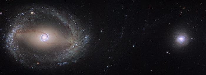 哈勃望远镜拍下连环星系杀手ngc1512的吞噬现场