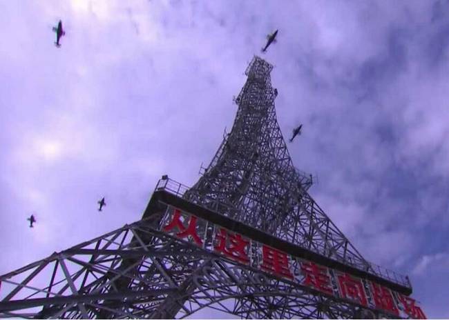 美称中国在朱日和试射4枚东风26及10枚东风16导弹