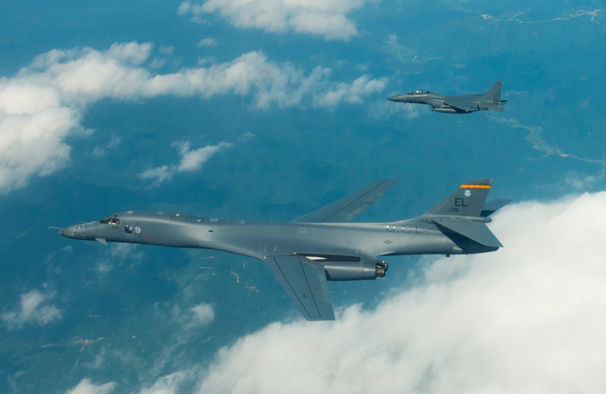 Two U.S. Air Force F-16 Fighting Falcons fly in support of NATO ...