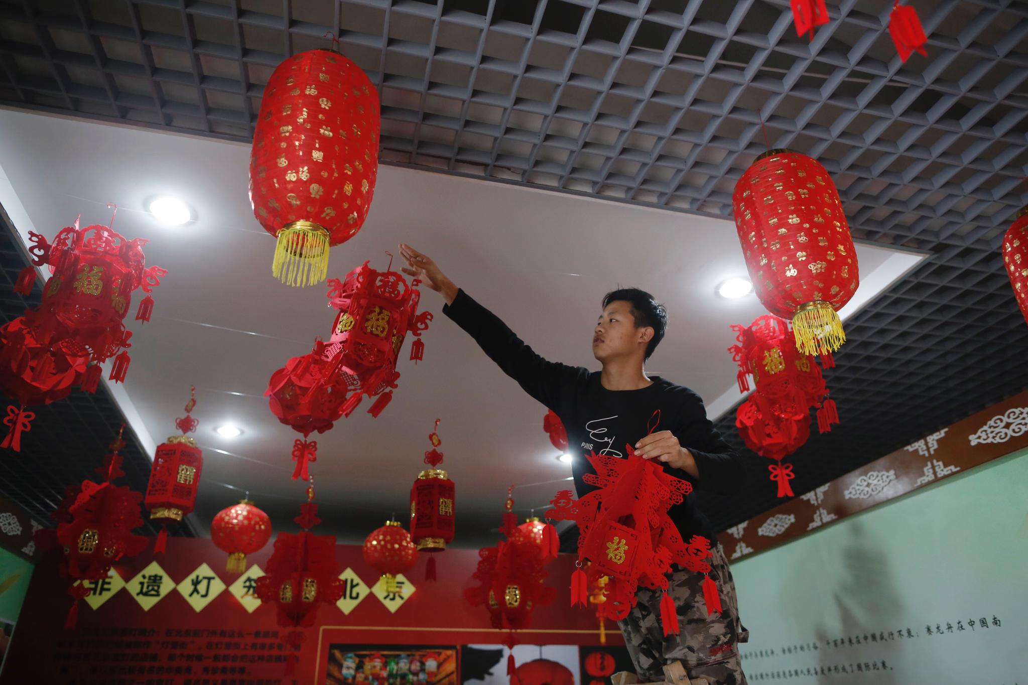 玉渊潭公园春节活动开幕邀游客体验传统年味儿