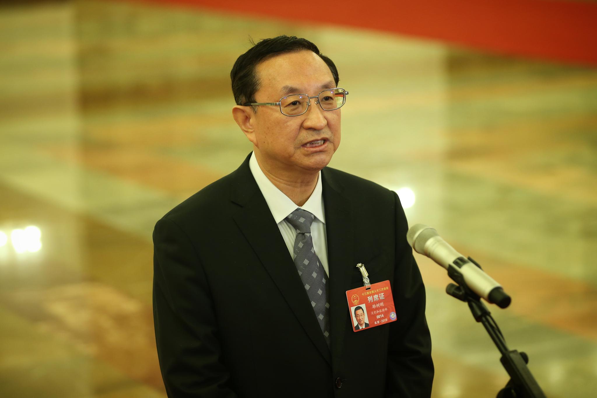 文化和旅游部部长雒树刚回答记者提问。新京报记者 薛珺 彭子洋 摄