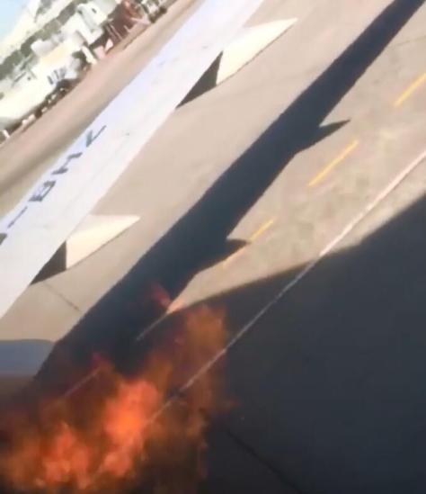  俄乌塔航空公司波音737-800客机发动机起火 （图源：俄罗斯REN-TV网站）