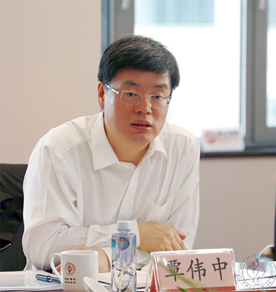 张虎,覃伟中任广东省副省长