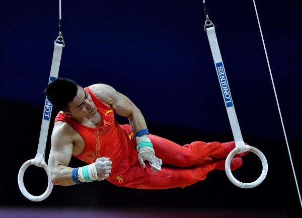 体操世锦赛中国男团惊险夺冠 获东京奥运会参赛资格