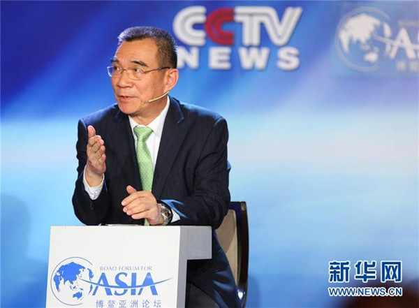 林毅夫在博鳌亚洲论坛2014年年会电视辩论“改革：亚洲金融与贸易的新格局”上发言（2014年4月8日摄）。 新华社记者 王婧嫱 摄
