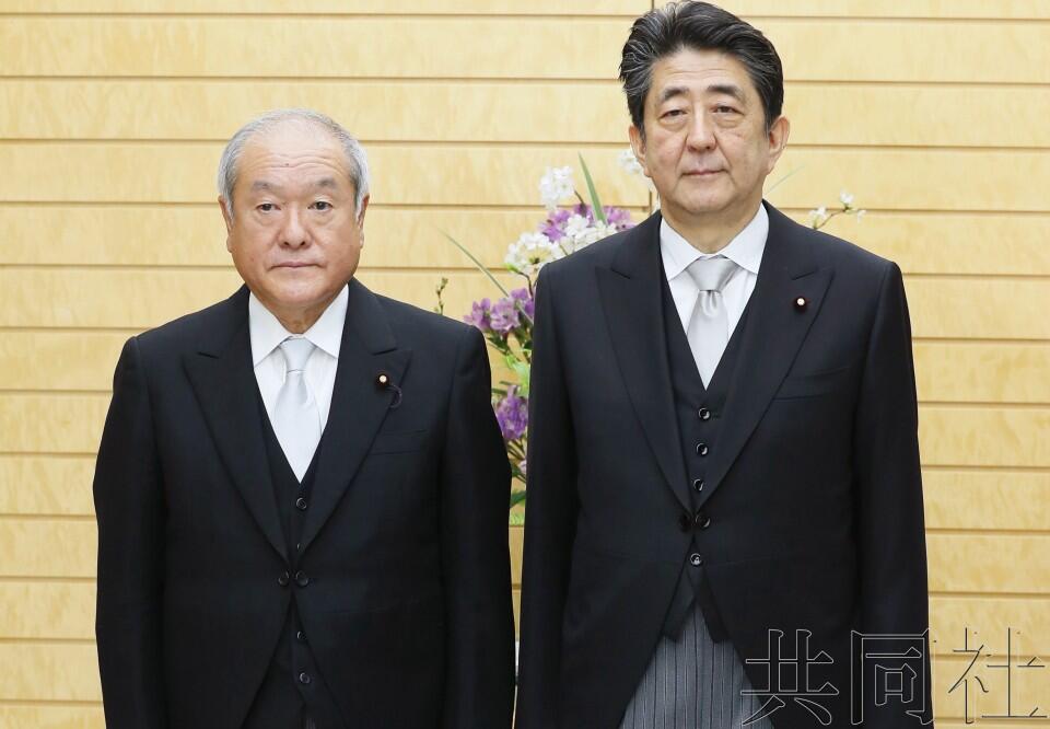 日本新任奥运相铃木俊一和始相安倍晋三