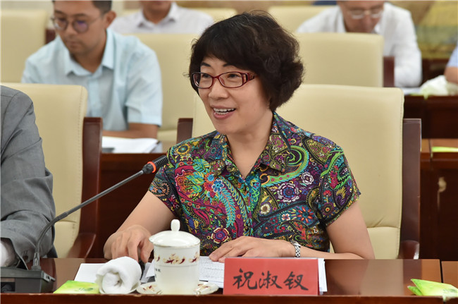 从左至右依次是:张富民,王学斌,阎美蓉8月23日,最高人民检察院举行各