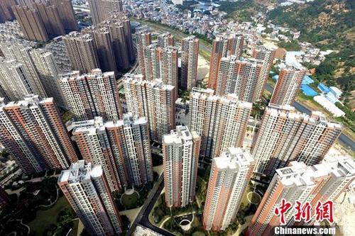原料图:楼盘 中新社记者 王东明 摄 原料图:楼盘 中新社记者 王东明 摄