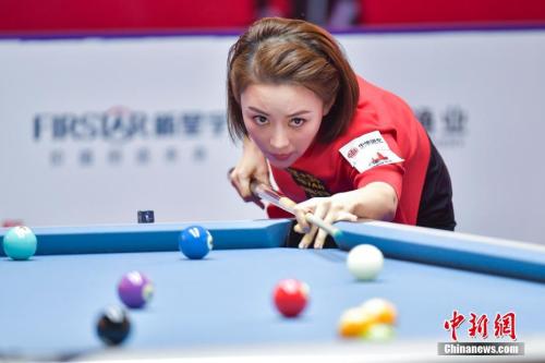 潘晓婷台球比赛 潘晓婷的眼神里总是充满杀气。(资料图)中新社记者 骆云飞 摄