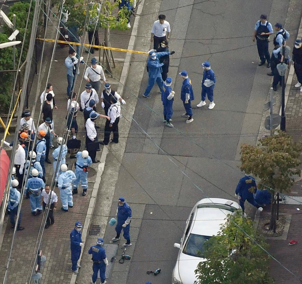 日本黑帮火拼当街杀人大批警力深夜出动包围山口组总部图