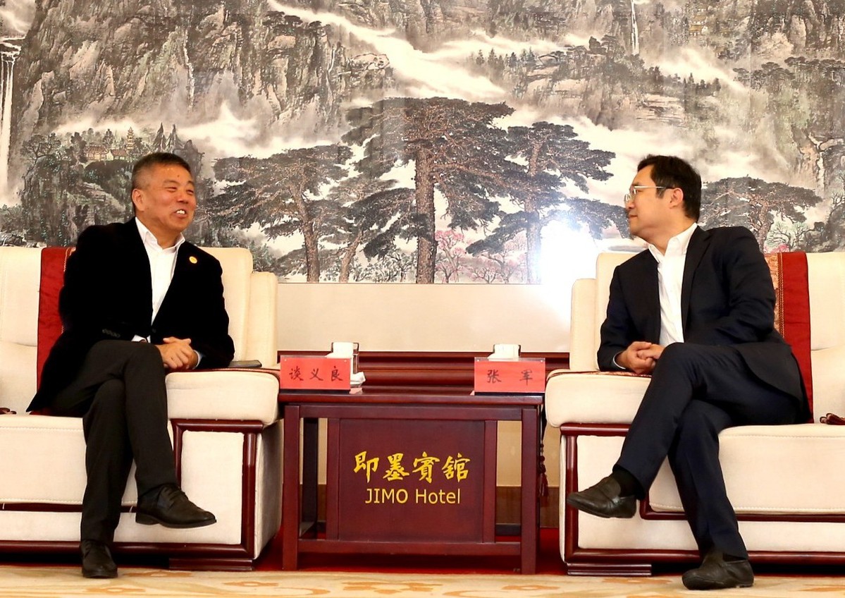 青岛市即墨区区委书记张军与九如城集团董事长谈义良座谈交流