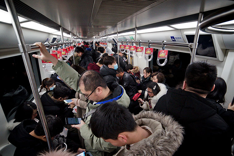 春节后首个工作日 北京地铁秩序井然|西街|上班族|地铁_新浪网