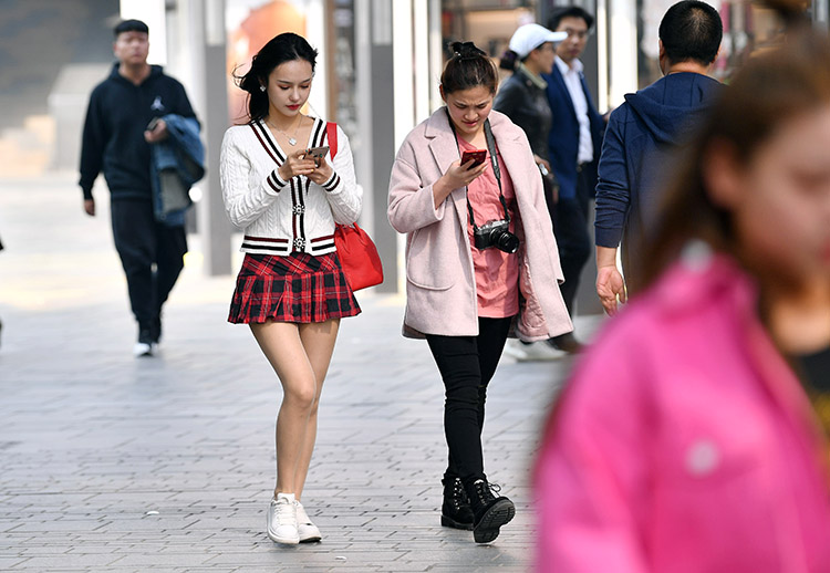 是春是夏还是冬京城升温街头乱穿衣