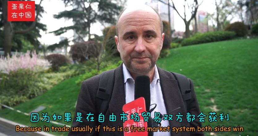 街采外国人:中美贸易战谁会赢?
