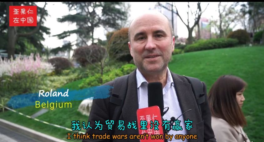 街采外国人:中美贸易战谁会赢?