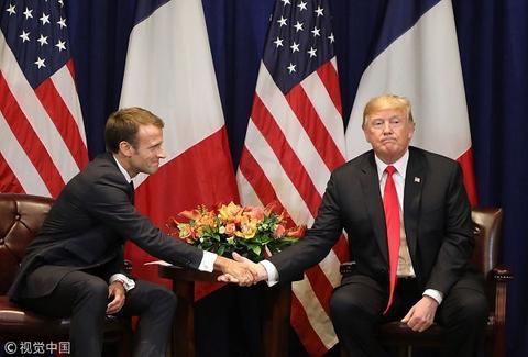  法国总统马克龙和美国总统特朗普（视觉中国）