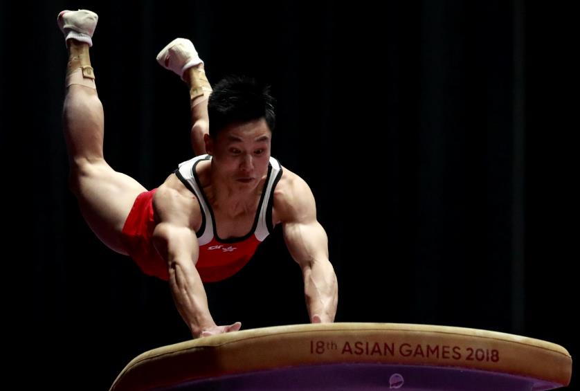 石伟雄衞冕亚运男子跳马金牌