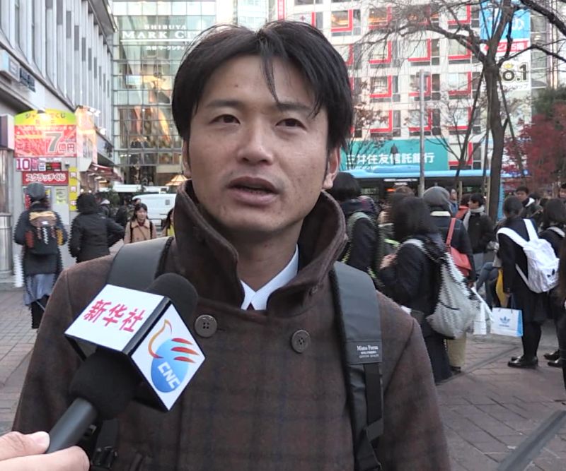 梁田江接受采访。(视频截图)