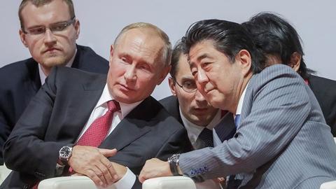 俄罗斯总统普京和日本首相安倍（日经亚洲评论网）