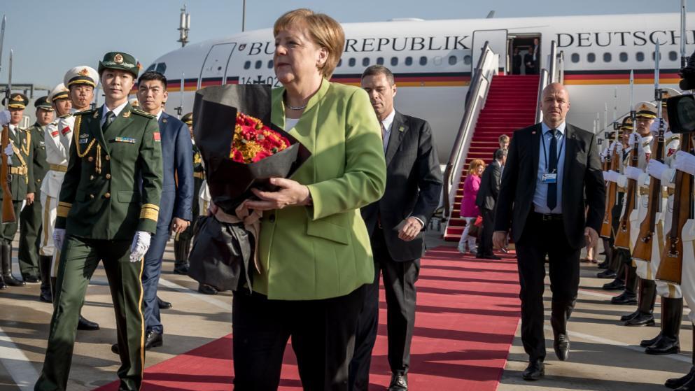 (图片来源:德新社)【环球网报道 记者 朱梦颖】德国总理默克尔访华