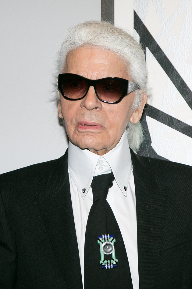 拥有标志性白发长辫和黑墨镜的一代时尚教父"老佛爷"karl