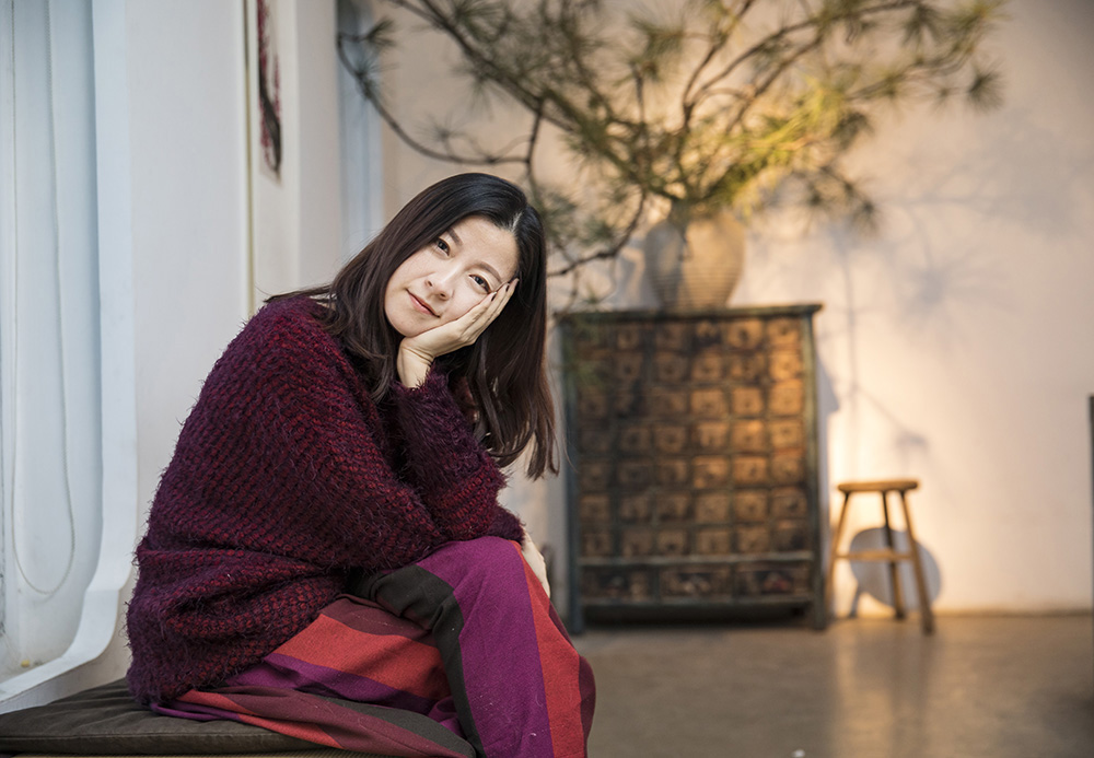 她想用一场音乐会温暖被互联网"绑架"的人