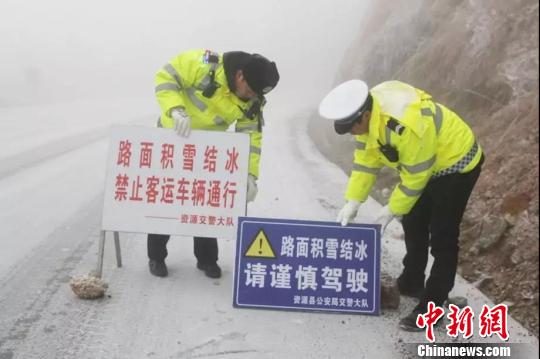 广西雨雪冰冻天气致多条道路交通中断|全州|路