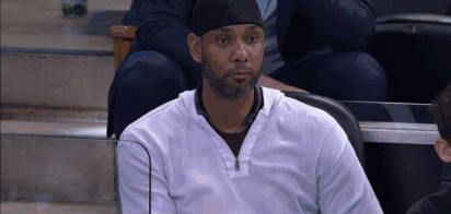 请盯着这张图看~~ 邓肯面目表情,目光呆滞 如果不是fox体育的广告 我