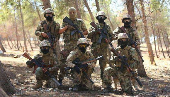 在叙利亚作战的俄罗斯雇佣兵.图片来源:参考消息