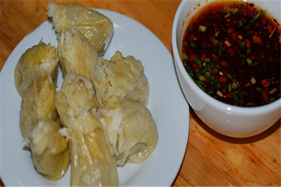 刷把头刷把头:刷把头是兴义的名小吃,起始于清朝同治年间,因形状如竹