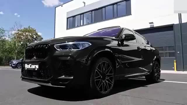 宝马x6m化身黑武士动感时尚的外观尽显霸气风姿