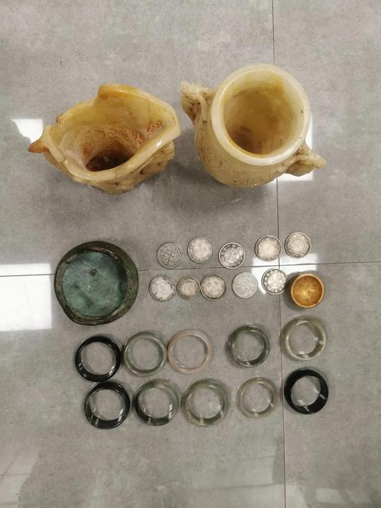 临海公安破获一起假古董诈骗的案件嫌疑人暗设局中局